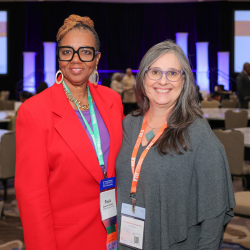 Two smiling conference attendees at AACN Conference
