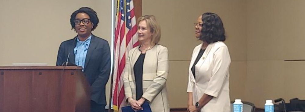 Image of AACN President/CEO Dr. Deborah Trautman standing next to AAN President Dr. Linda Scott and Representative Lauren Underwood 