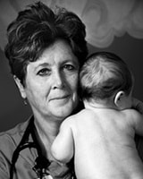 Image of female medical professional holding infant