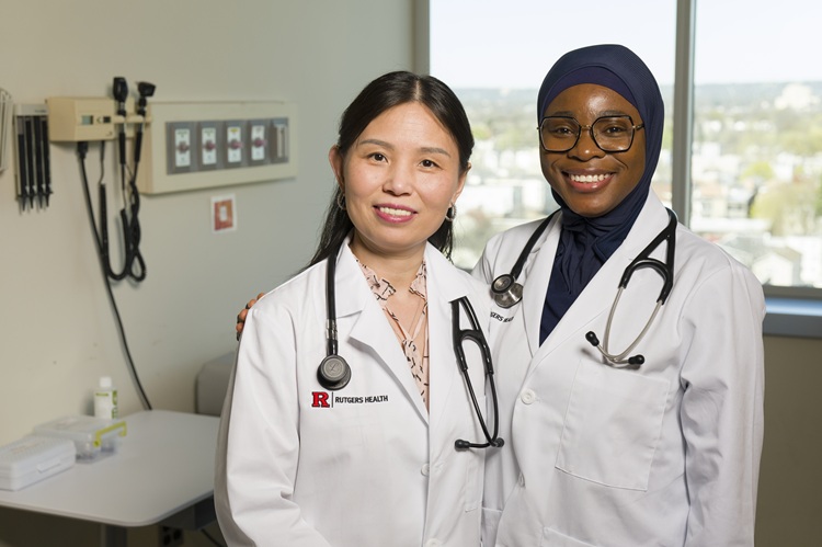 Two women smiling in a medical office