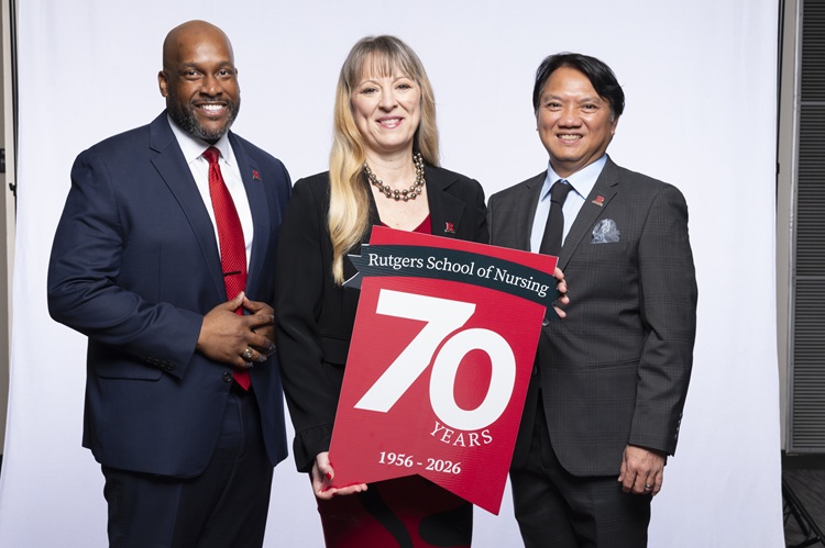 Rutgers University School of Nursing dean Angela Starkwater receiving ACE Award