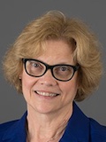 headshot of Debbie DeMeester